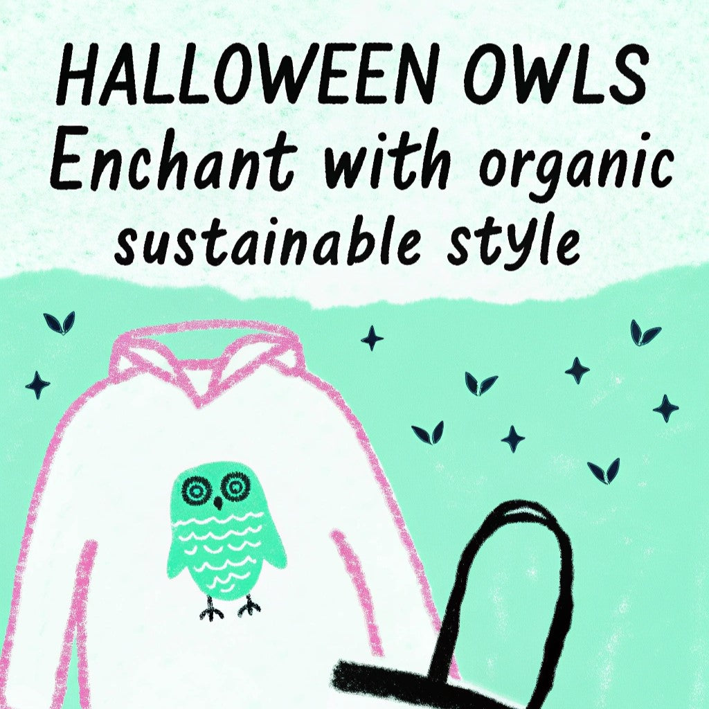 Model in owl-embroidered organic sweatshirt with pumpkins and fall decor. A blend of cozy Halloween charm and sustainable fashion.