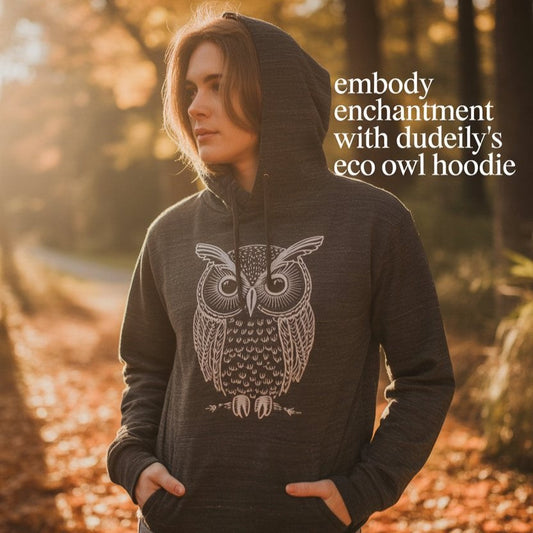 Model in dark gray owl hoodie surrounded by autumn leaves. Ethical, cozy, and eco-friendly fall fashion for mindful USA shoppers.