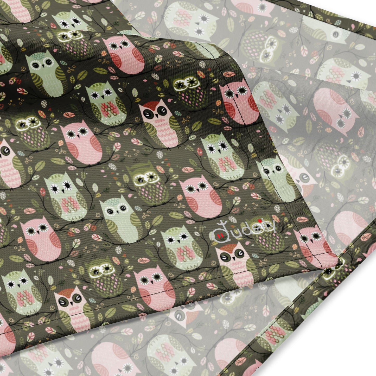 All-over print bandana featuring a stylish and versatile owl theme, perfect for adding a unique touch to your outfit.